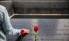 People take a moment of silence to remember loved ones during an anniversary ceremony commemorating the terrorist attacks of 9/11 in New York City on Sept. 11, 2015. (Andrew Burton/Getty Images)
