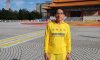Kim Sung Soo, a retired government official from South Korea, is dressed in colored clothes for the character formation in Taipei on Nov. 26, 2016. (Frank Fang/Epoch Times)
